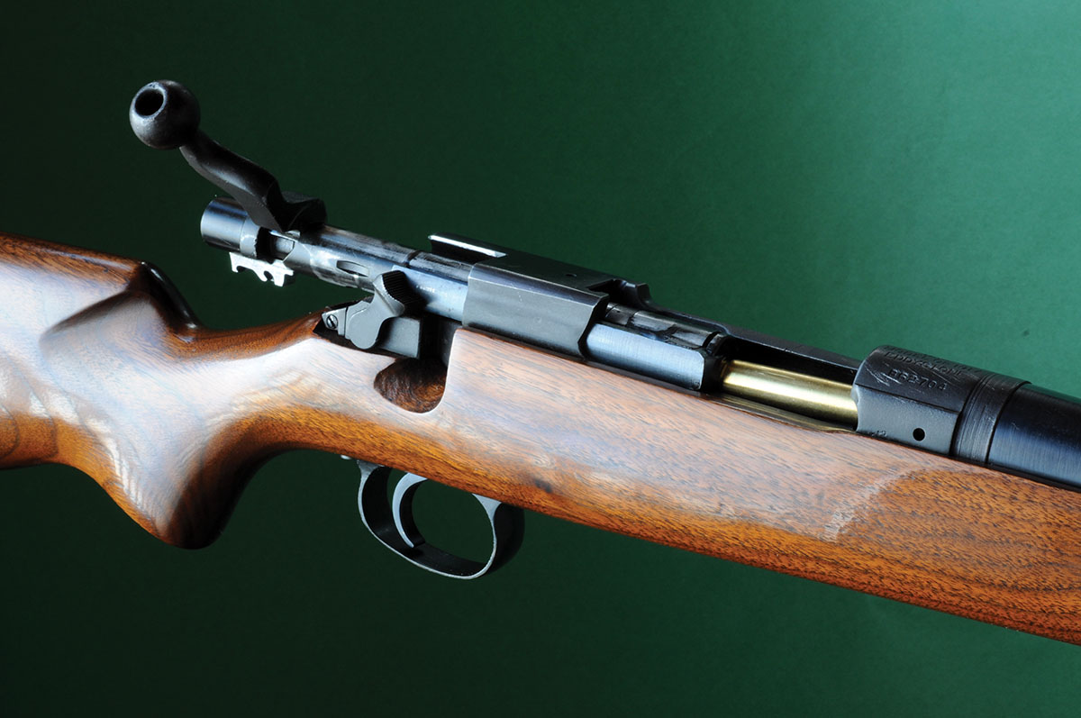 The long, non-rotating extractor on this much-modified 1917 Enfield is clearly applying tension on the cartridge to hold it against the bolt face in and out of the chamber.